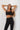 Move bra black in model front view - JUV