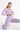 Rainbow legging purple front view in model - JUV