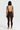 Sleek long jumpsuit brown in model back view - JUV