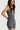 Sleek short jumpsuit gray in model side view close up - JUV