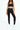 Tighty legging black in model front view - JUV