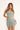 Unicorn short green in model front view - JUV 