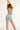 Unicorn short green in model back view - JUV 